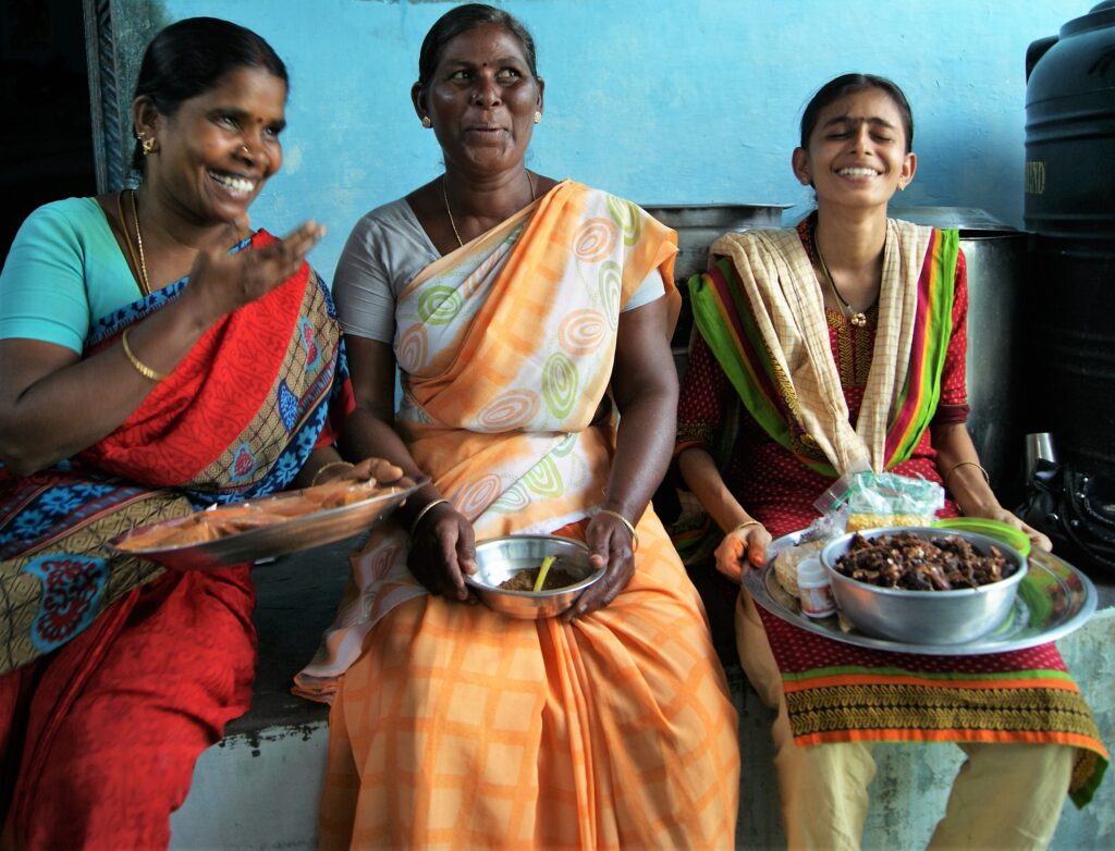 Group of 3 people mid laugh