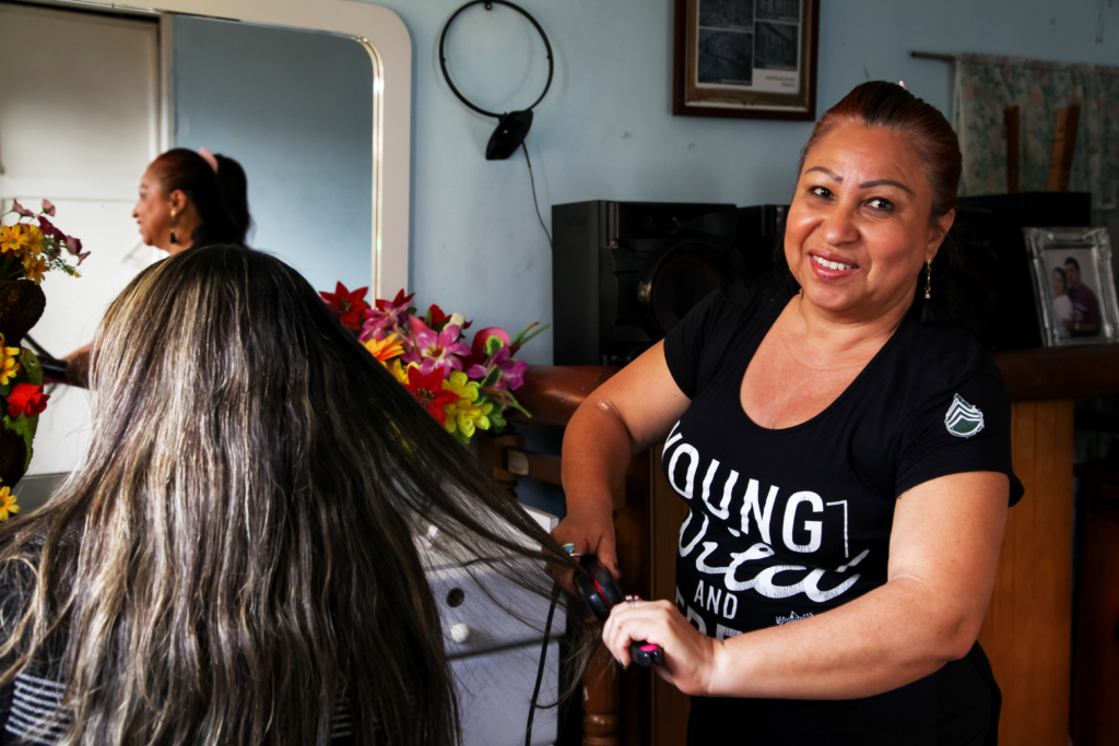 Albalibia in Colombia used her loan to diversify the merchandise sales of her beauty salon business